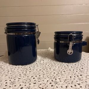 2 blue canisters
